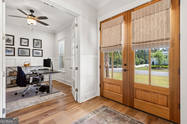 105 Whispering Oaks Ln, Saint Marys, GA 31558 - doorway featuring crown molding, french doors, wood finished floors, and a ceiling fan