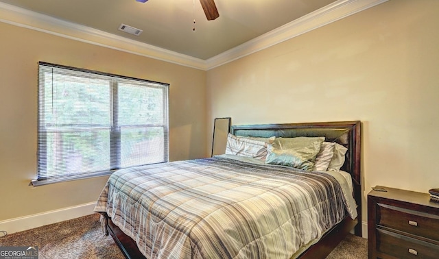 bedroom featuring visible vents, baseboards, a ceiling fan, crown molding, and carpet floors