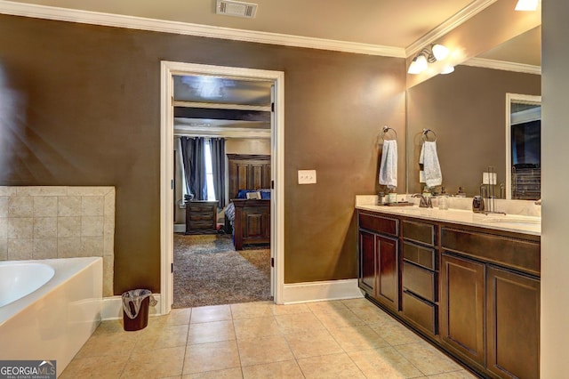 full bathroom with crown molding, a bath, visible vents, double vanity, and baseboards