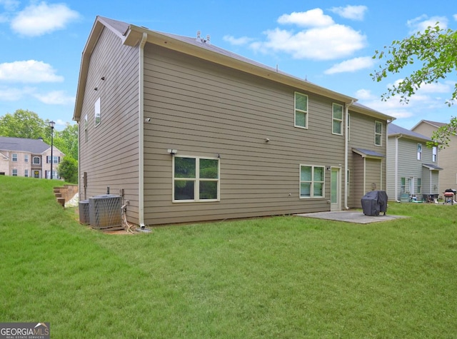 5280 Clingman Ct, Douglasville, GA 30135 - rear view of property featuring a patio and a lawn