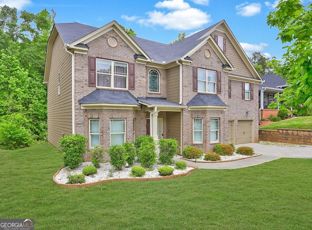 craftsman-style house featuring a garage, concrete driveway, a front lawn, and brick siding