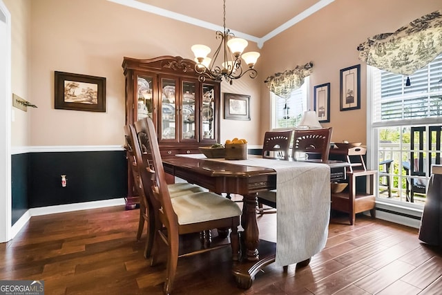 561 Valleyside Dr, Dallas, GA 30157 - dining space featuring ornamental molding, a chandelier, dark wood-style floors, and healthy amount of natural light