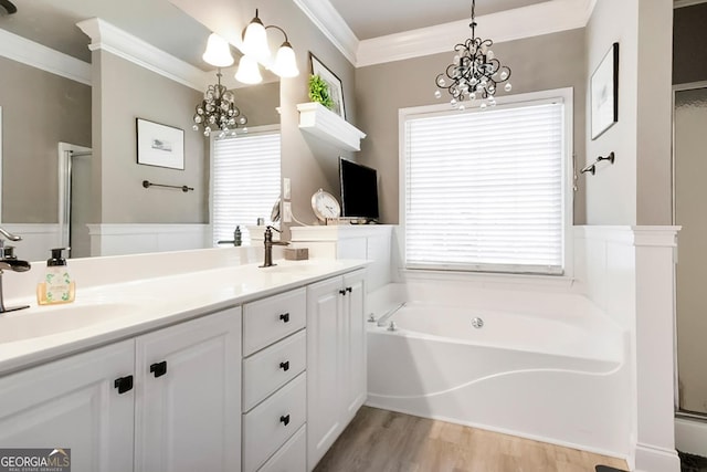 561 Valleyside Dr, Dallas, GA 30157 - full bath with a chandelier, wood finished floors, a bath, a shower stall, and double vanity