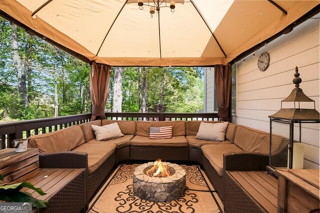 561 Valleyside Dr, Dallas, GA 30157 - deck with a gazebo and an outdoor living space with a fire pit