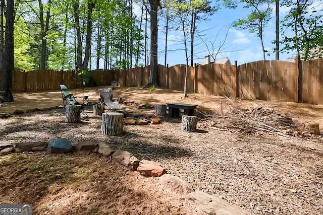 view of yard with a fenced backyard