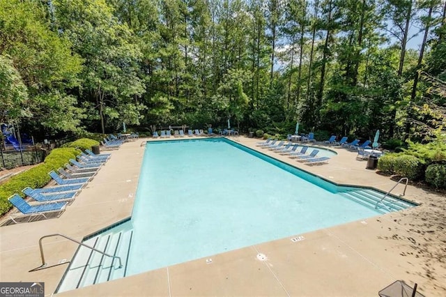 561 Valleyside Dr, Dallas, GA 30157 - community pool with a patio and view of scattered trees
