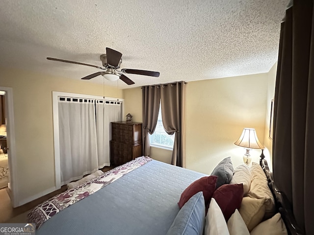 80 Hill Farm Rd, Alamo, GA 30411 - bedroom with a textured ceiling and ceiling fan