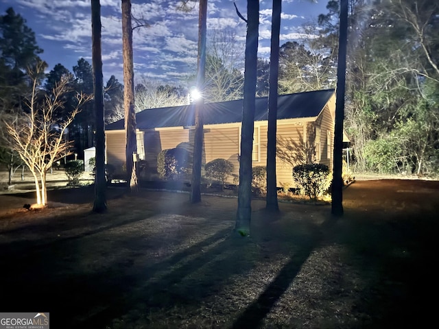 80 Hill Farm Rd, Alamo, GA 30411 - view of front facade featuring metal roof