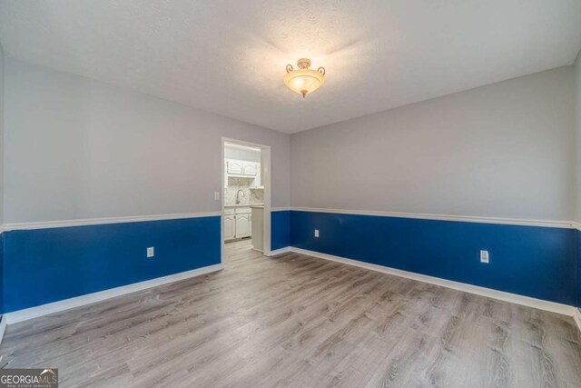 29 Monte Ln, Jefferson, GA 30549 - unfurnished room with wood finished floors and baseboards