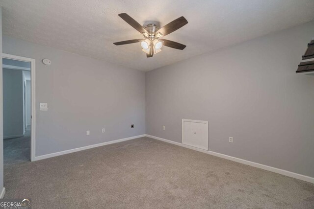 29 Monte Ln, Jefferson, GA 30549 - unfurnished room featuring carpet flooring, a ceiling fan, and a smoke detector