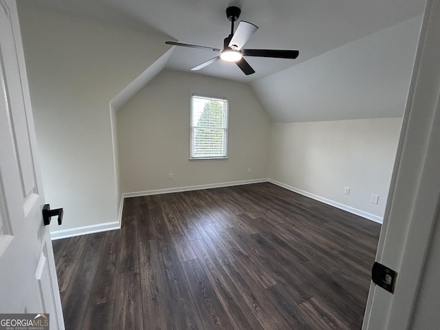 22 Edgewood Dr, Carrollton, GA 30116 - additional living space featuring ceiling fan, baseboards, dark wood-style floors, and lofted ceiling