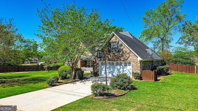view of front facade featuring concrete driveway, a front lawn, brick siding, a garage, and fence