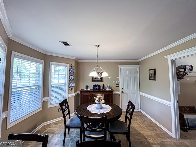 dining area featuring visible vents, baseboards, and stone finish flooring