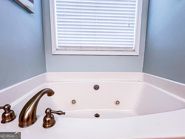 bathroom with a jetted tub