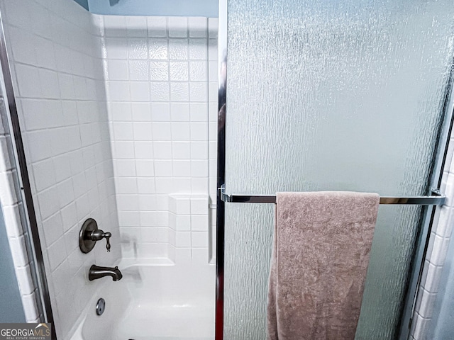full bathroom featuring shower / bath combination with glass door