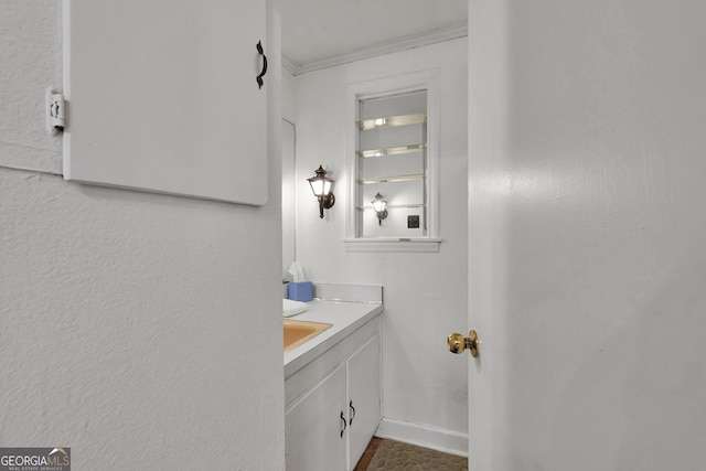 215 Cedar St, Anderson, SC 29626 - bathroom featuring vanity, baseboards, and ornamental molding