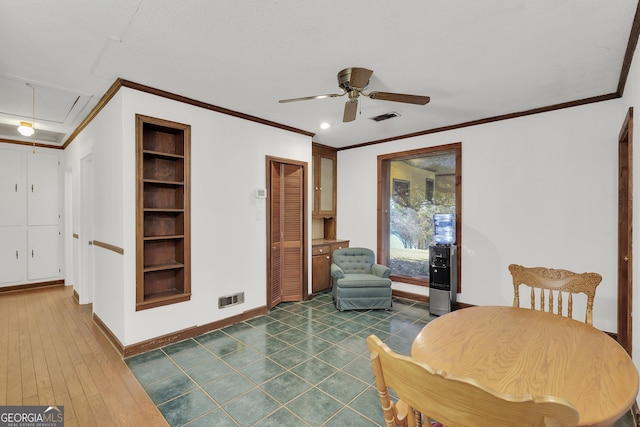215 Cedar St, Anderson, SC 29626 - living area featuring visible vents, baseboards, attic access, and ceiling fan