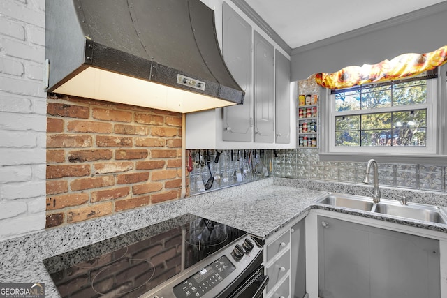 215 Cedar St, Anderson, SC 29626 - kitchen featuring gray cabinetry, under cabinet range hood, electric stove, and a sink