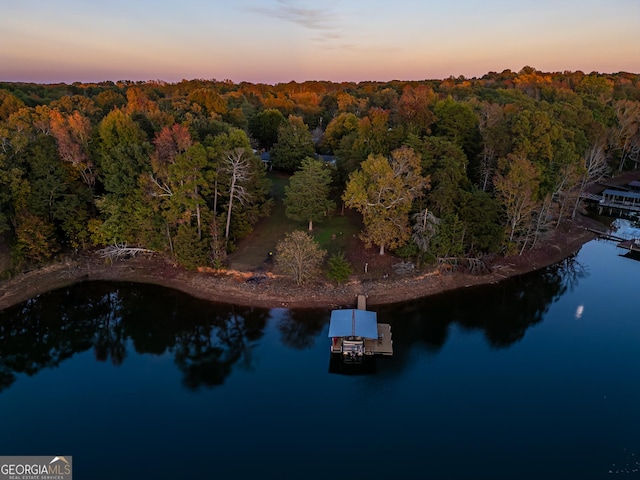 215 Cedar St, Anderson, SC 29626 - aerial view at dusk featuring a wooded view and a water view