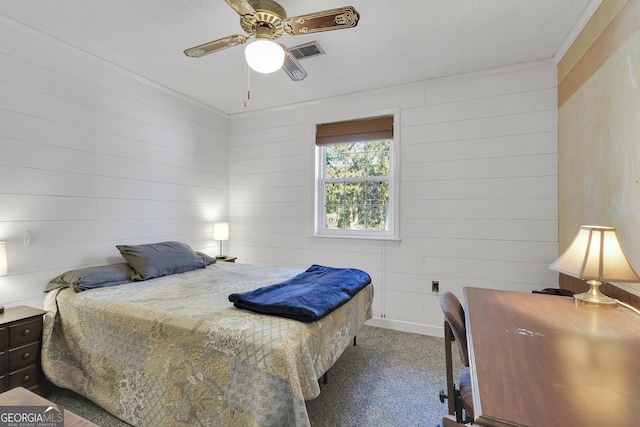 215 Cedar St, Anderson, SC 29626 - bedroom with wood walls, visible vents, crown molding, and carpet floors