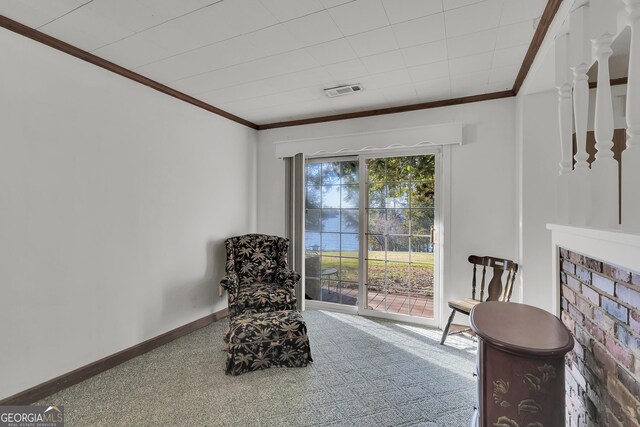 215 Cedar St, Anderson, SC 29626 - living area featuring carpet flooring, visible vents, baseboards, and ornamental molding