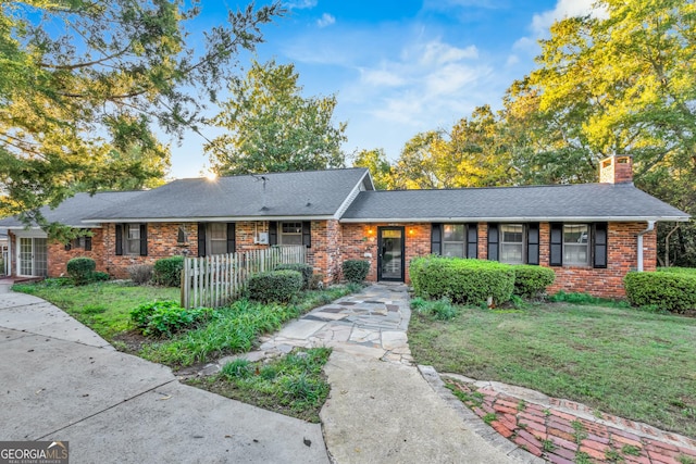 215 Cedar St, Anderson, SC 29626 - single story home featuring a chimney, a shingled roof, a front lawn, and brick siding