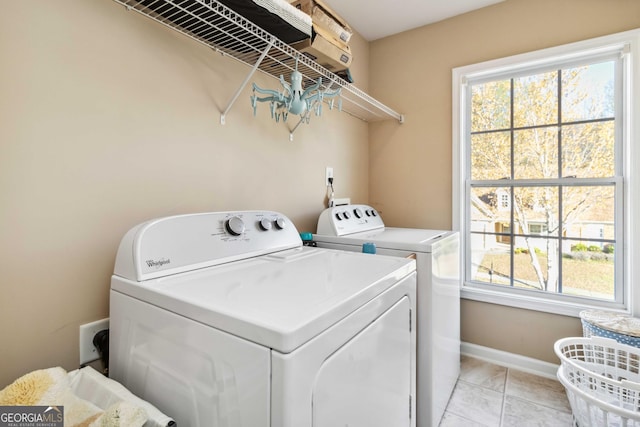 2319 White Alder Dr, Buford, GA 30519 - laundry room with baseboards, a wealth of natural light, independent washer and dryer, and laundry area