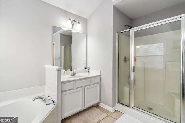 2319 White Alder Dr, Buford, GA 30519 - bathroom featuring a stall shower, a garden tub, vanity, and tile patterned floors