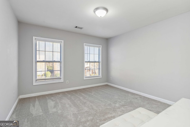 2319 White Alder Dr, Buford, GA 30519 - carpeted empty room featuring baseboards and visible vents