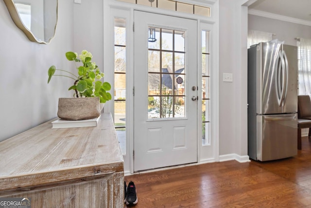 2319 White Alder Dr, Buford, GA 30519 - foyer entrance with crown molding, wood finished floors, and baseboards