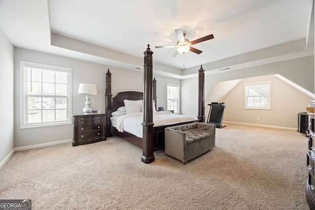 32 Winifred Way, Senoia, GA 30276 - carpeted bedroom featuring a tray ceiling, baseboards, and ceiling fan