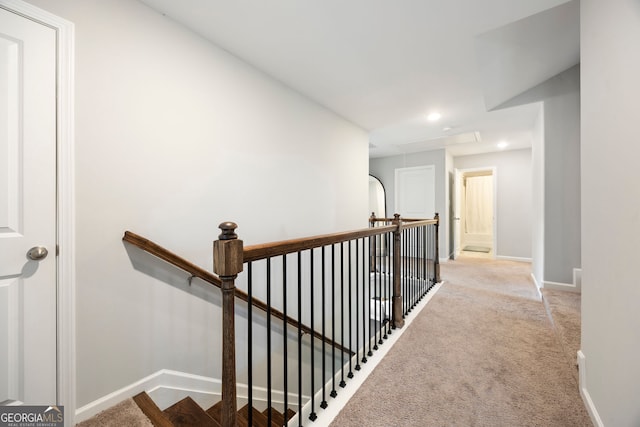 32 Winifred Way, Senoia, GA 30276 - hall featuring an upstairs landing, baseboards, carpet, attic access, and recessed lighting