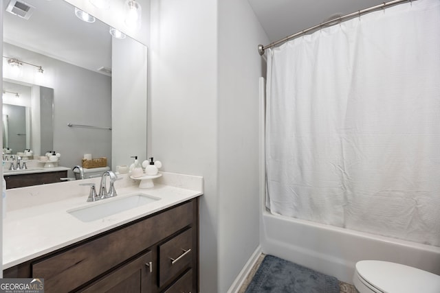 32 Winifred Way, Senoia, GA 30276 - full bath featuring vanity, shower / bath combo with shower curtain, toilet, and baseboards