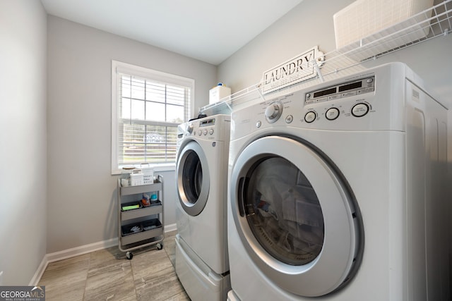 32 Winifred Way, Senoia, GA 30276 - washroom featuring separate washer and dryer, light wood-style floors, and baseboards