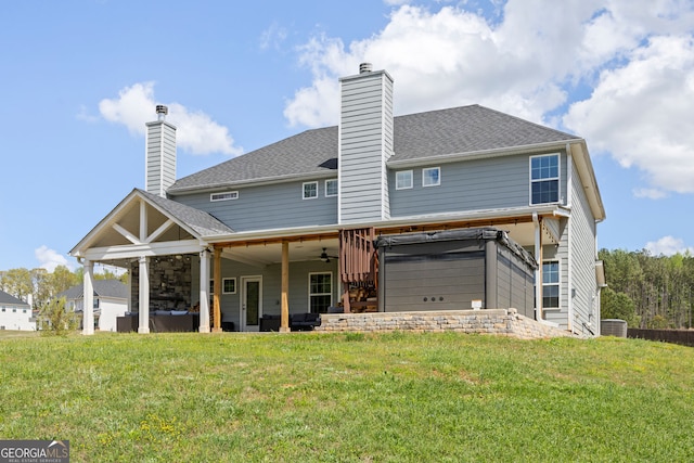 32 Winifred Way, Senoia, GA 30276 - rear view of property with ceiling fan, a hot tub, a yard, and a patio
