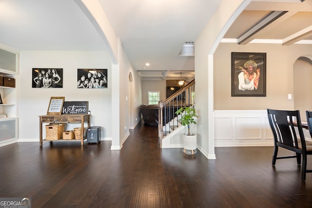 32 Winifred Way, Senoia, GA 30276 - corridor featuring arched walkways, stairway, and wood finished floors