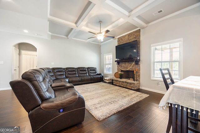 32 Winifred Way, Senoia, GA 30276 - living room featuring ceiling fan, arched walkways, beamed ceiling, coffered ceiling, and baseboards