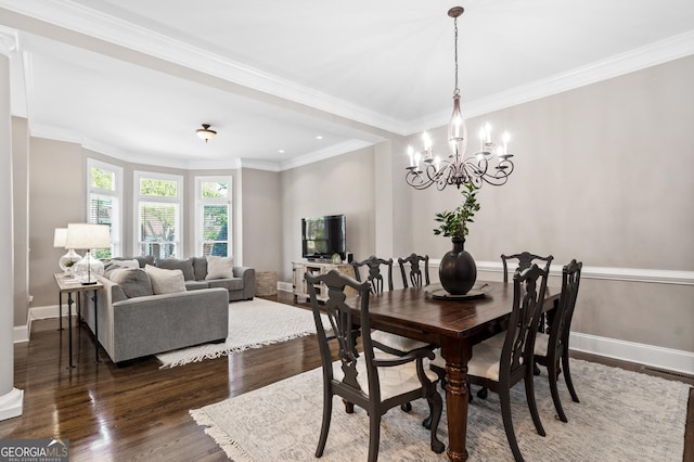 3105 Neal Ct, Cumming, GA 30041 - dining area with ornamental molding, recessed lighting, dark wood-style flooring, a notable chandelier, and baseboards