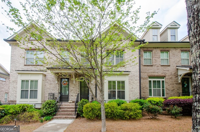 view of front of property with brick siding