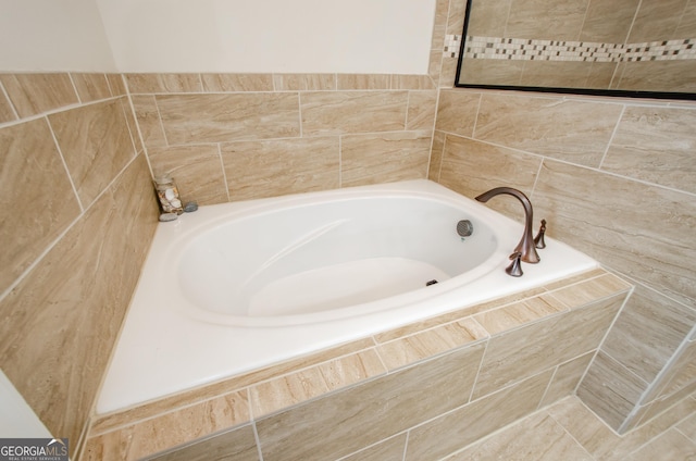 bathroom with a garden tub