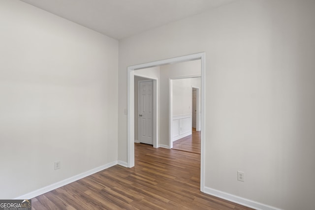 185 Cold Harbor Ct, Sharpsburg, GA 30277 - empty room featuring dark wood-style flooring and baseboards