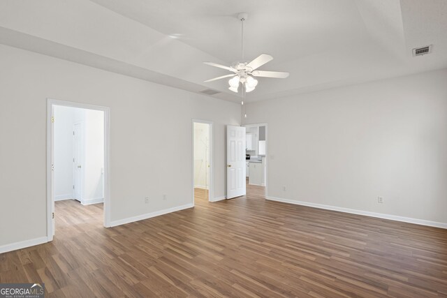 185 Cold Harbor Ct, Sharpsburg, GA 30277 - unfurnished room with visible vents, baseboards, a ceiling fan, and wood finished floors