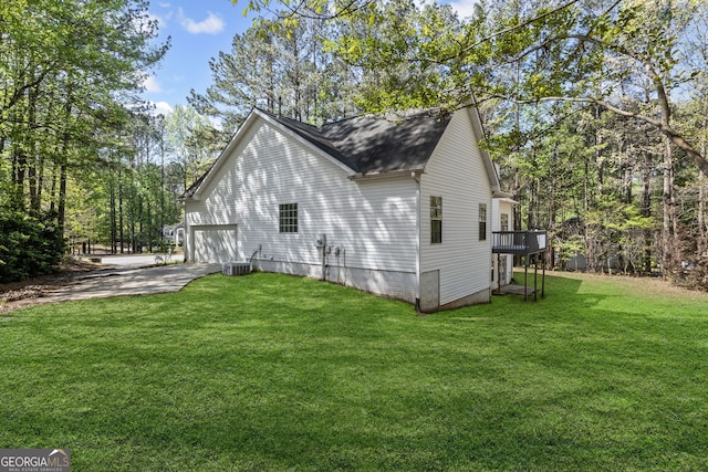 185 Cold Harbor Ct, Sharpsburg, GA 30277 - view of property exterior with a yard, central AC unit, driveway, and roof with shingles