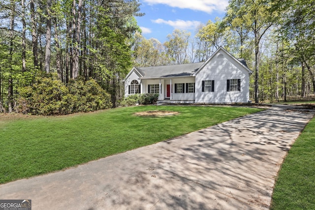 185 Cold Harbor Ct, Sharpsburg, GA 30277 - single story home with a front lawn and driveway