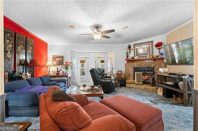 4941 N Helton Rd, Winston, GA 30187 - living room featuring crown molding, ceiling fan, carpet flooring, and a textured ceiling