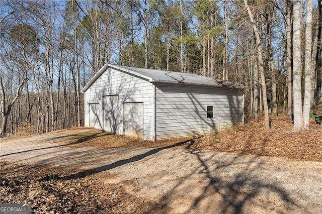 4941 N Helton Rd, Winston, GA 30187 - view of outdoor structure featuring an outbuilding and a wooded view