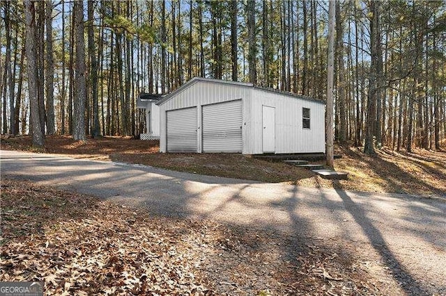 4941 N Helton Rd, Winston, GA 30187 - garage with a view of trees