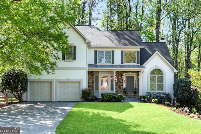 view of front of property featuring stucco siding, concrete driveway, an attached garage, and a shingled roof