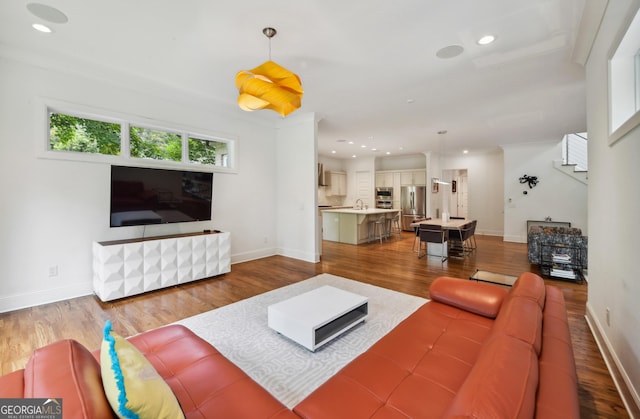 1155 Mcconnell Dr, Decatur, GA 30033 - living area featuring recessed lighting, baseboards, and wood finished floors