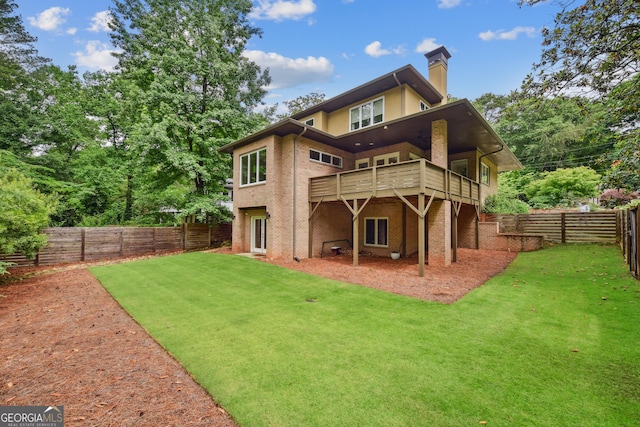 1155 Mcconnell Dr, Decatur, GA 30033 - rear view of property featuring a deck, a fenced backyard, a chimney, and a lawn